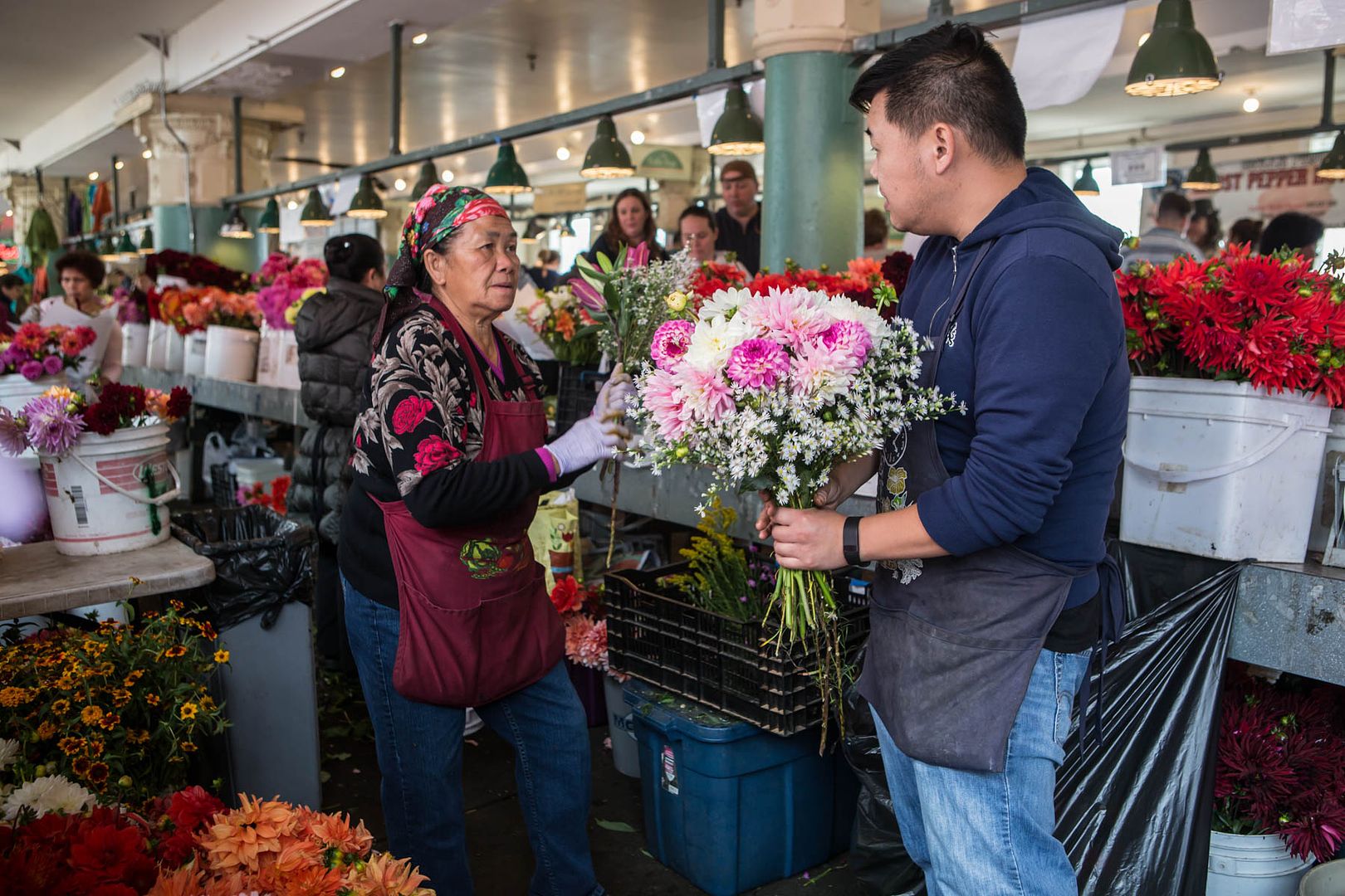 Scott and Chue prepare bouquets in the market photo 170322-sea-advert-ppmf3_zpsm0acisl2.jpg